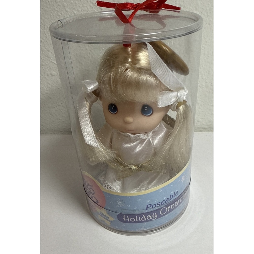 Precious moments, posable holiday angel ornament with box.